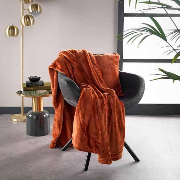 Plaid Billy potters clay 200x150cm over de stoel